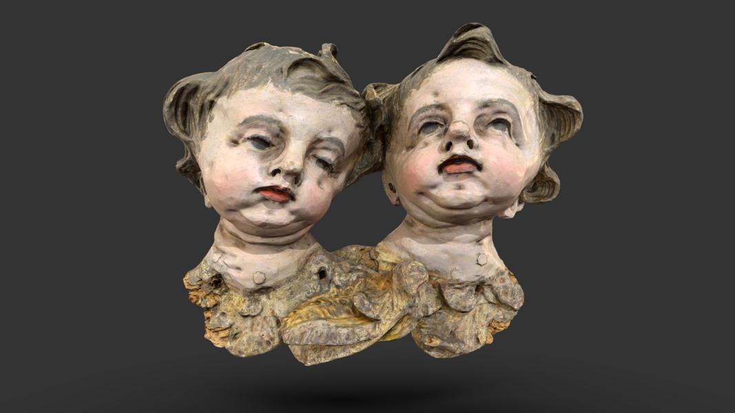 Two Paired Angel Heads