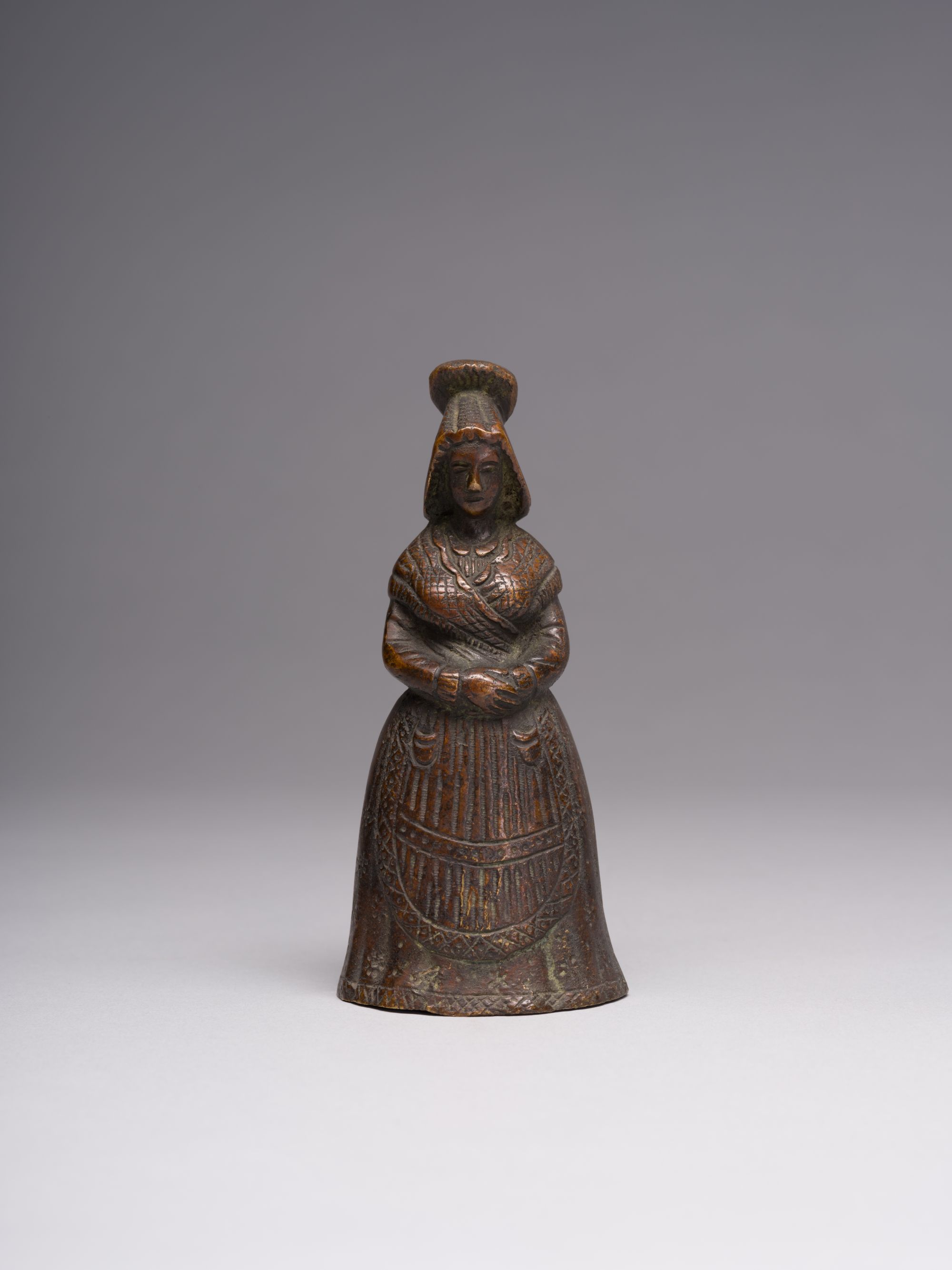 A Bell in the Shape of a Peasant Woman 1