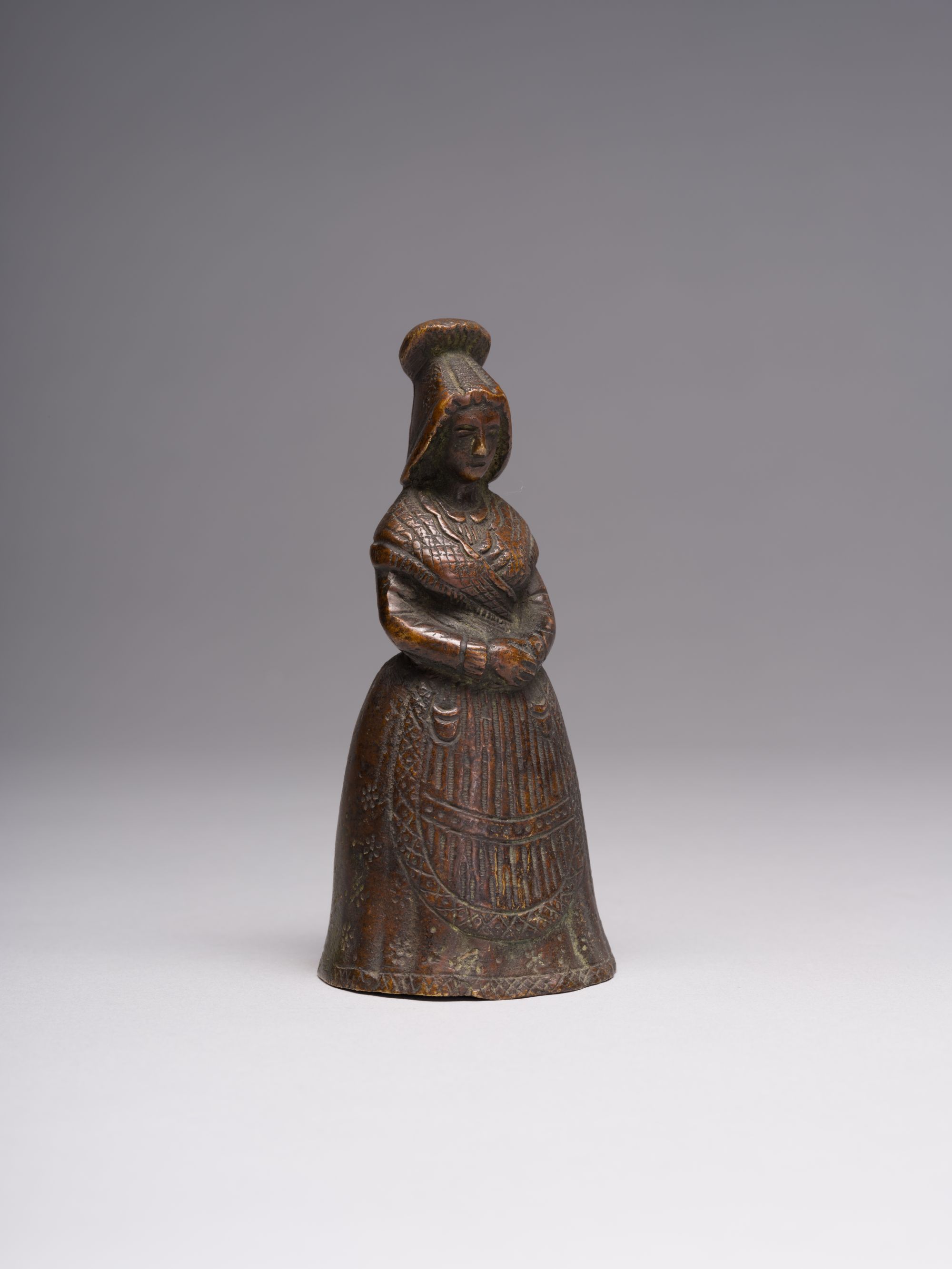 A Bell in the Shape of a Peasant Woman 6