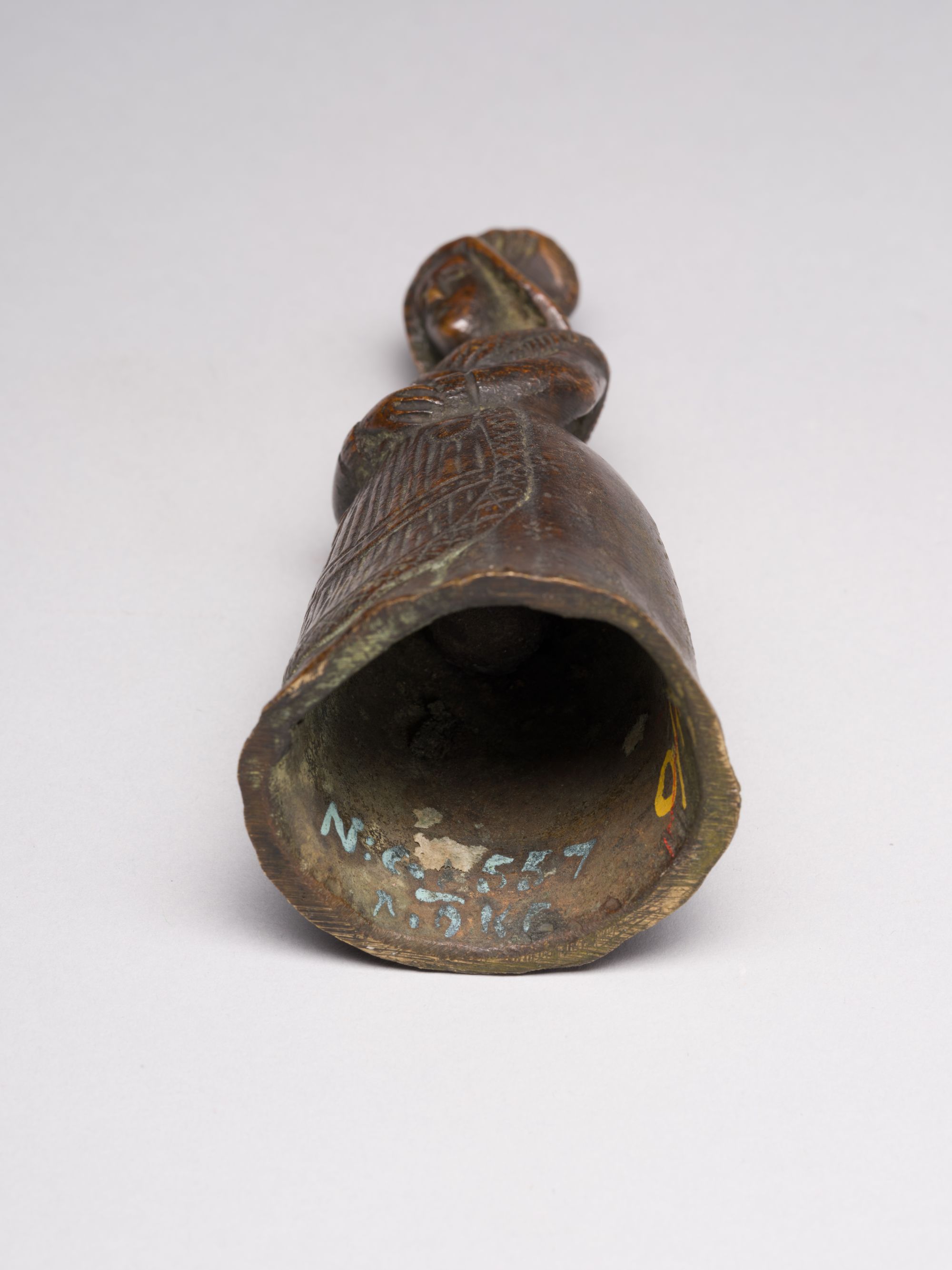 A Bell in the Shape of a Peasant Woman 8