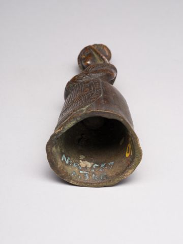 A Bell in the Shape of a Peasant Woman 8