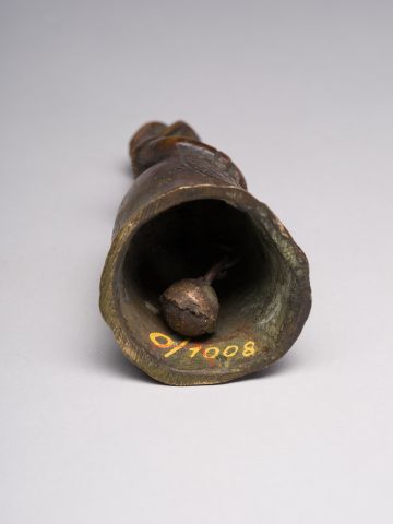 A Bell in the Shape of a Peasant Woman 7