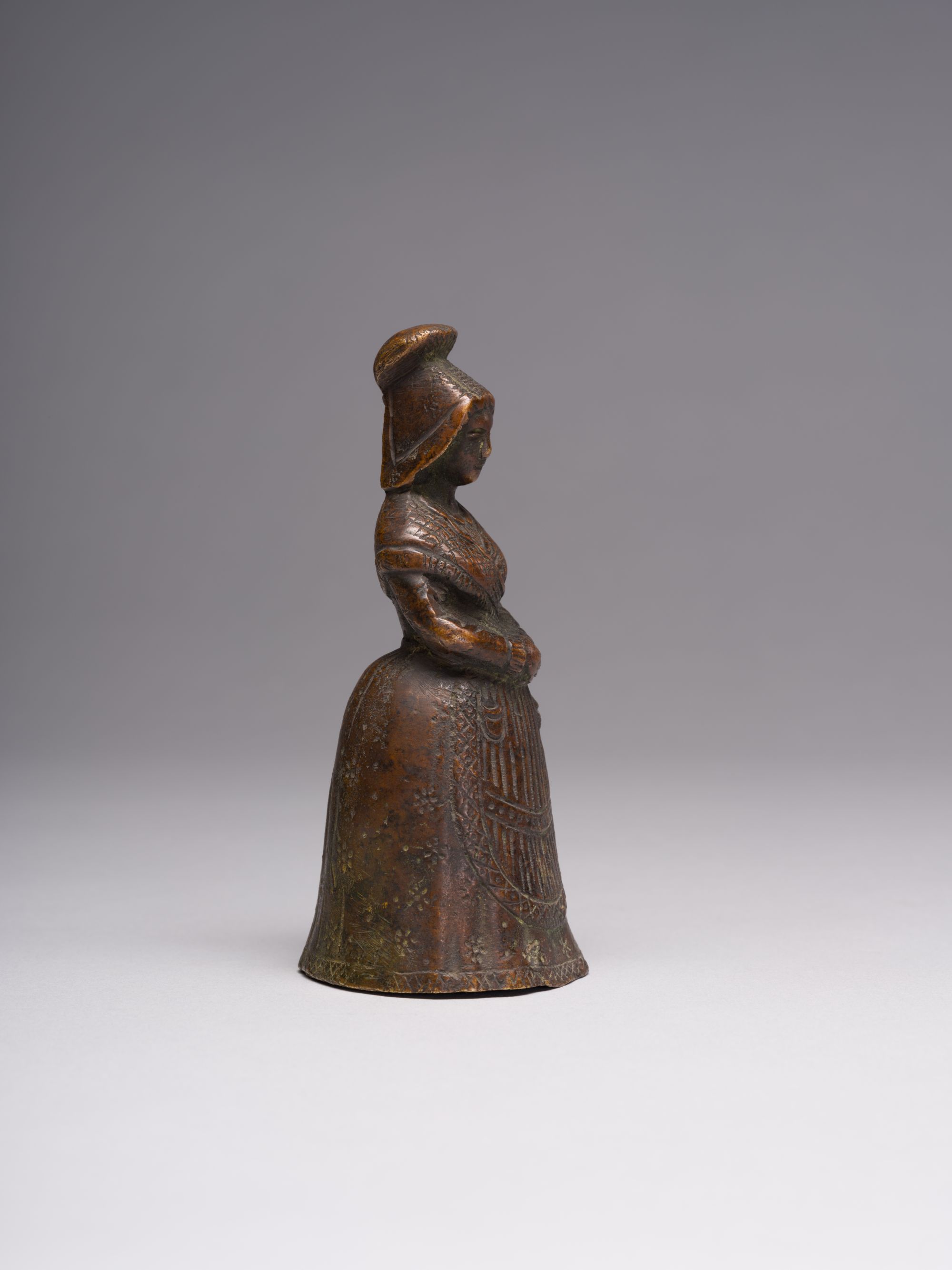 A Bell in the Shape of a Peasant Woman 5