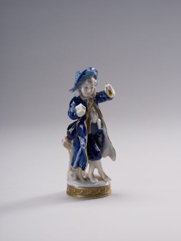 Boy with Fruits Figurine 7