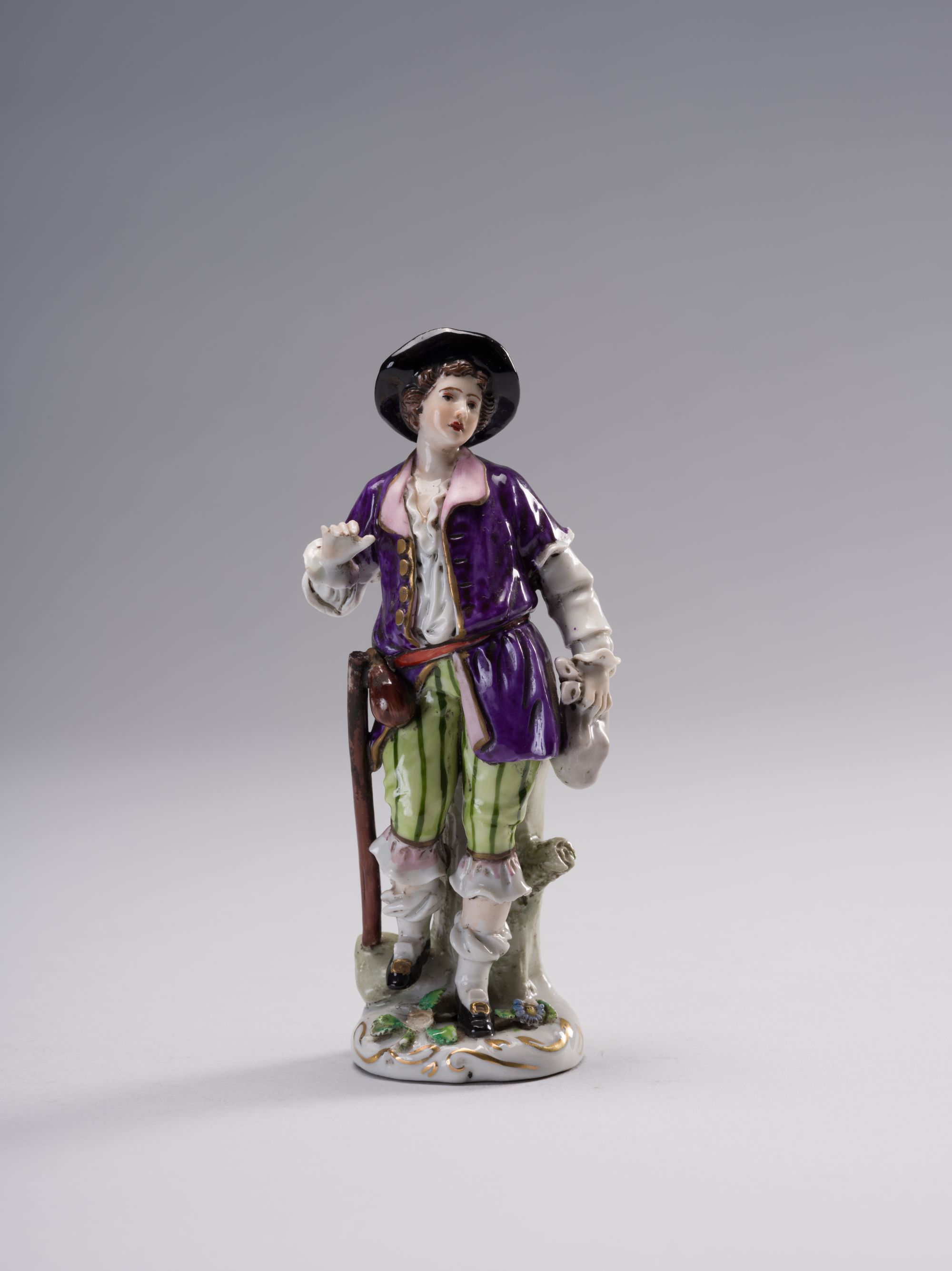 Young Man in a Hat Figurine 1