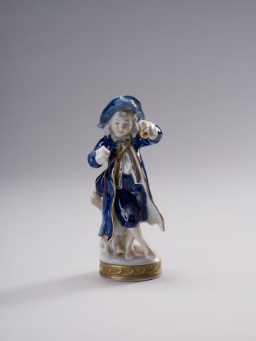 Boy with Fruits Figurine 1