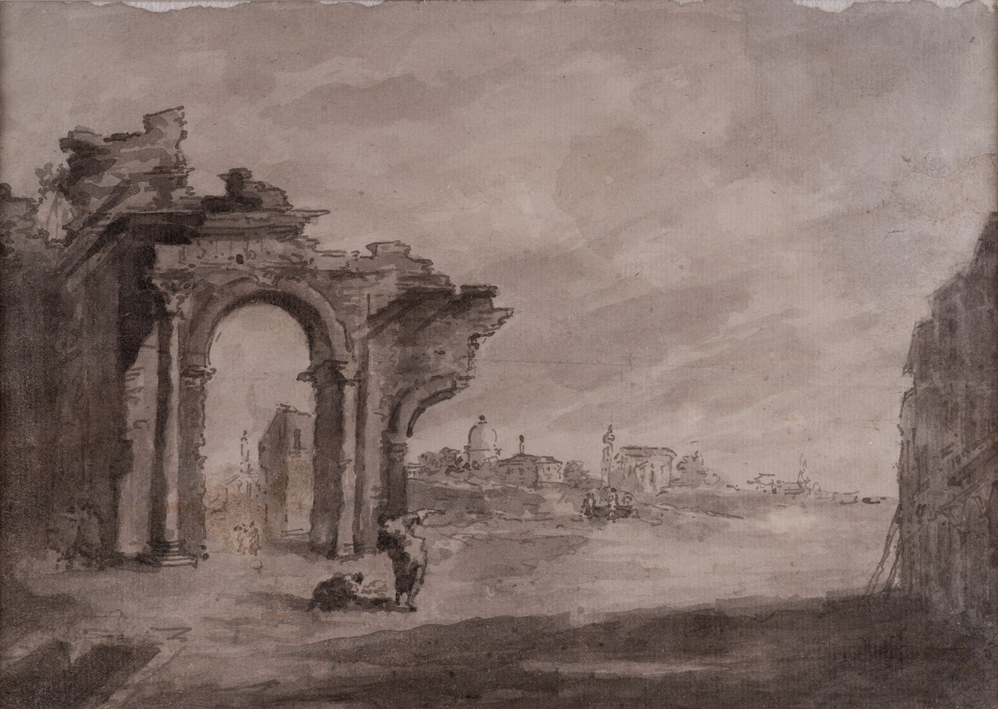 The ruins of the arch on the shore of the lagoon