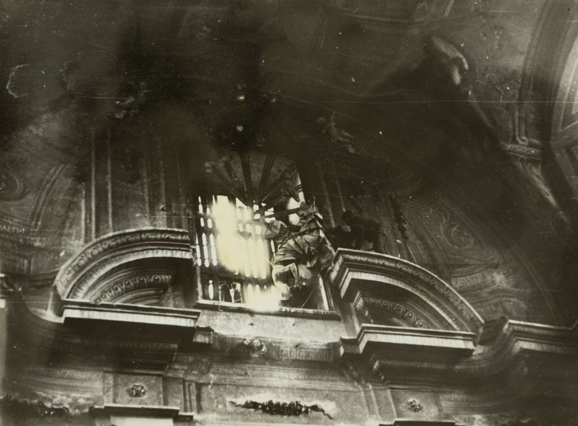 Dismantling a Wooden Sculpture from the Interior of a Church
